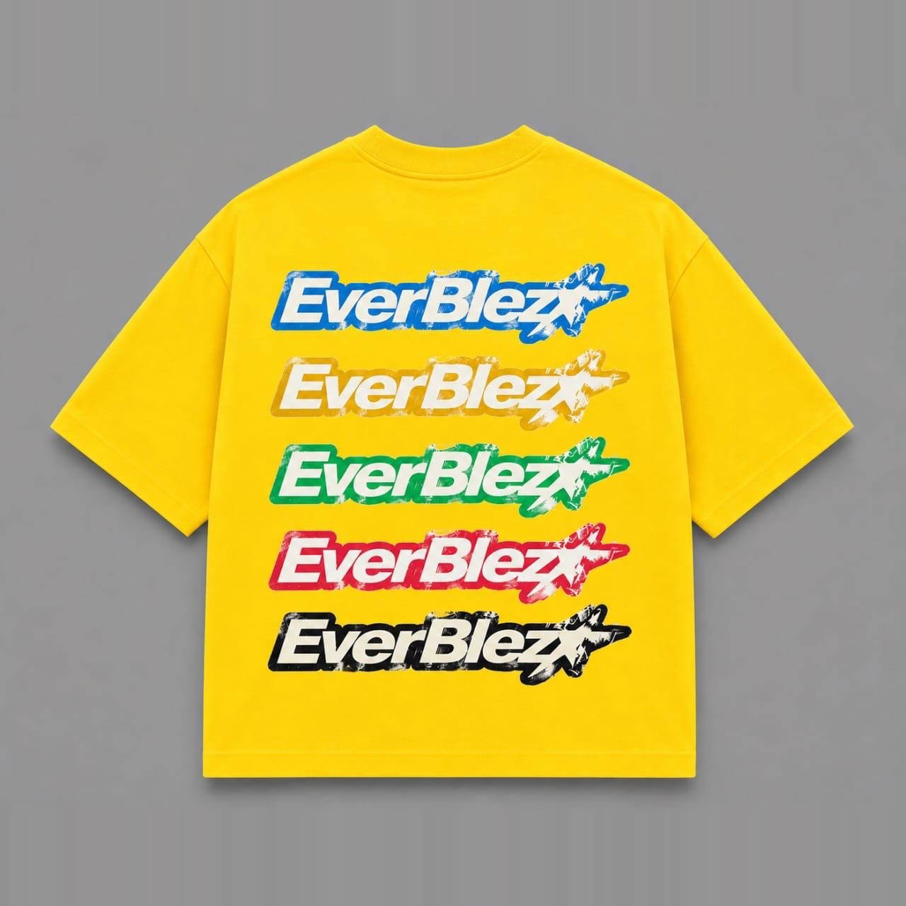 Everblez golden yellow T-shirt back with five stacked EVERBLEZ graphics in blue, white, green, red and black